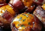 Cheddar-stuffed BBQ bacon bombs ready for grilling